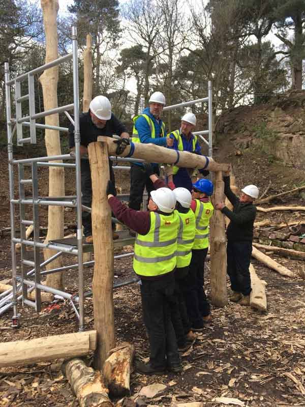 Lifting our first Wall Plate beam into position.